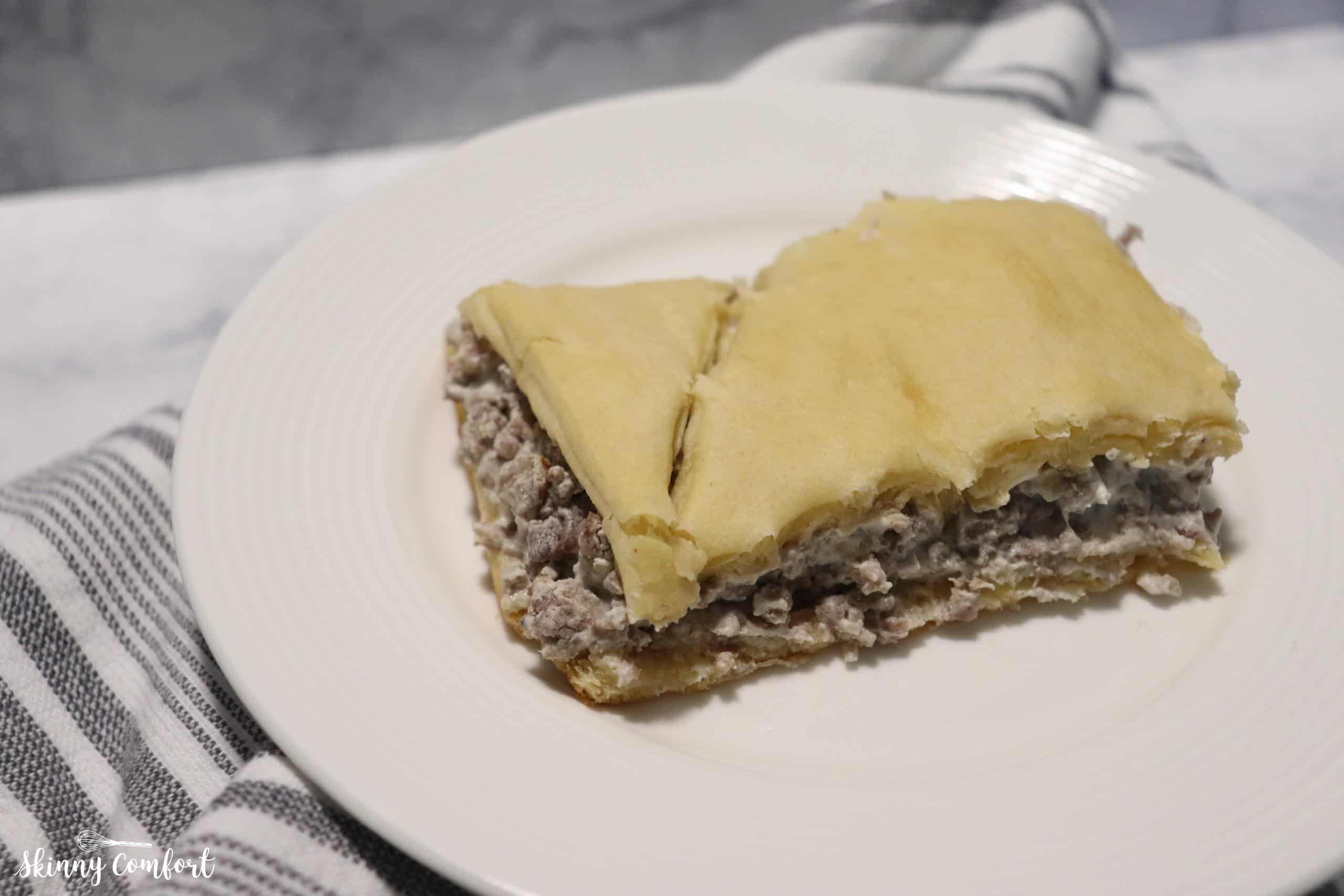 Piece of cream cheese sausage casserole on a plate