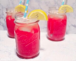 skinny pink party punch with lemon garnish
