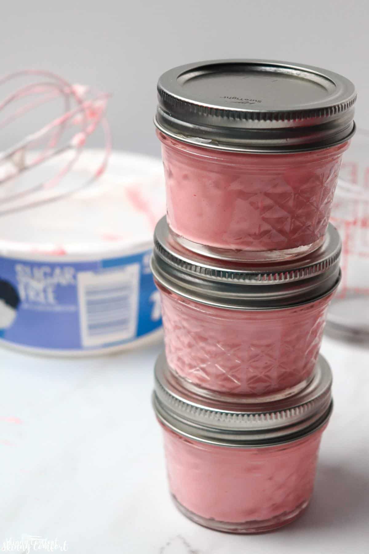 sugar free strawberry fluff in stacked mason jars