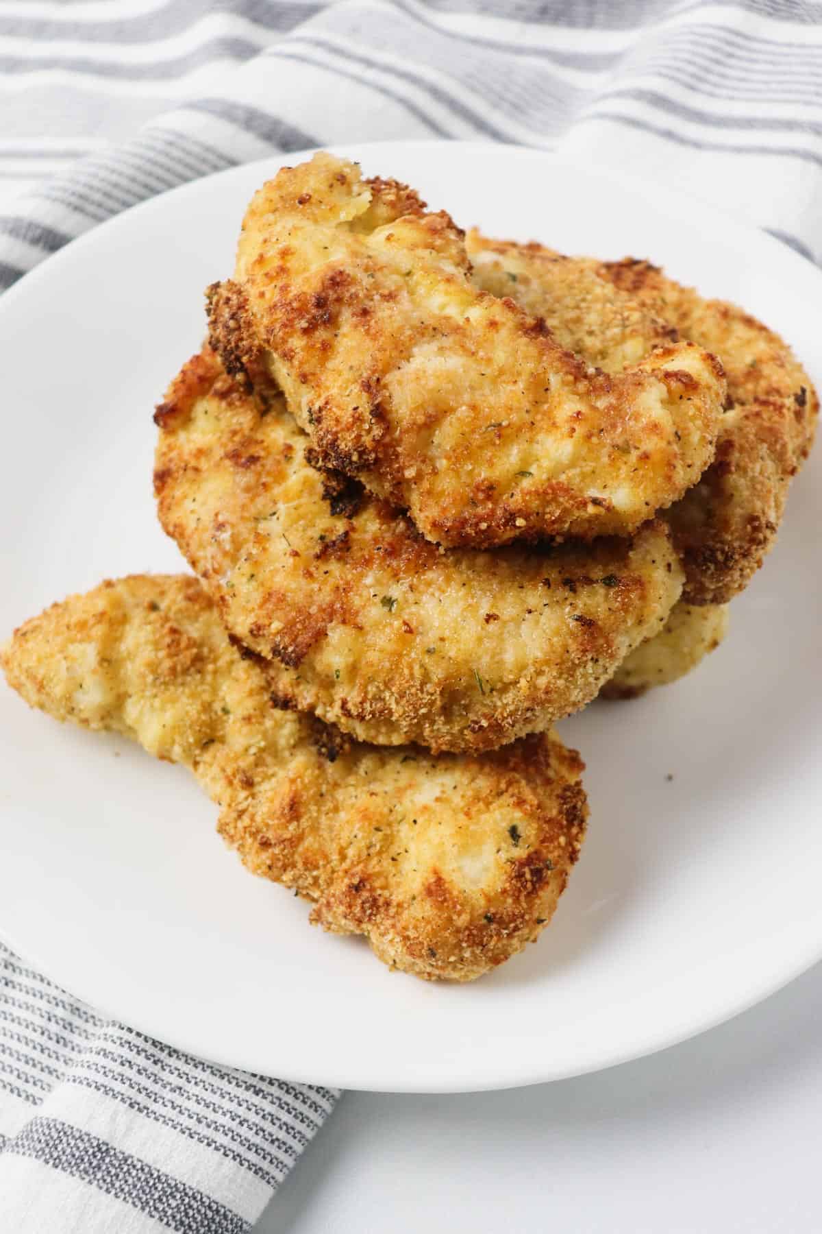 pile of chicken tenders on plate