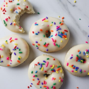 finished air fryer biscuit donuts with sprinkles