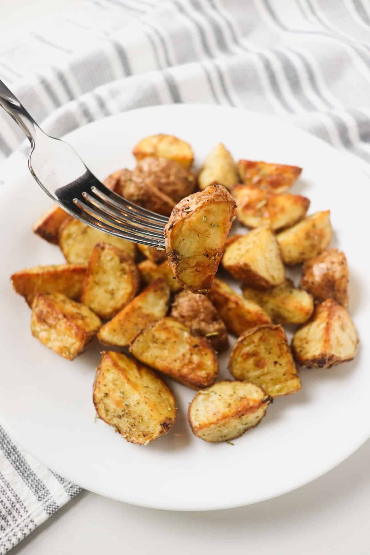 air fryer roasted potato piece on fork