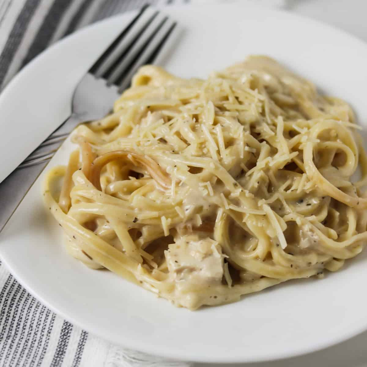 finished instant pot skinny chicken alfredo on fork