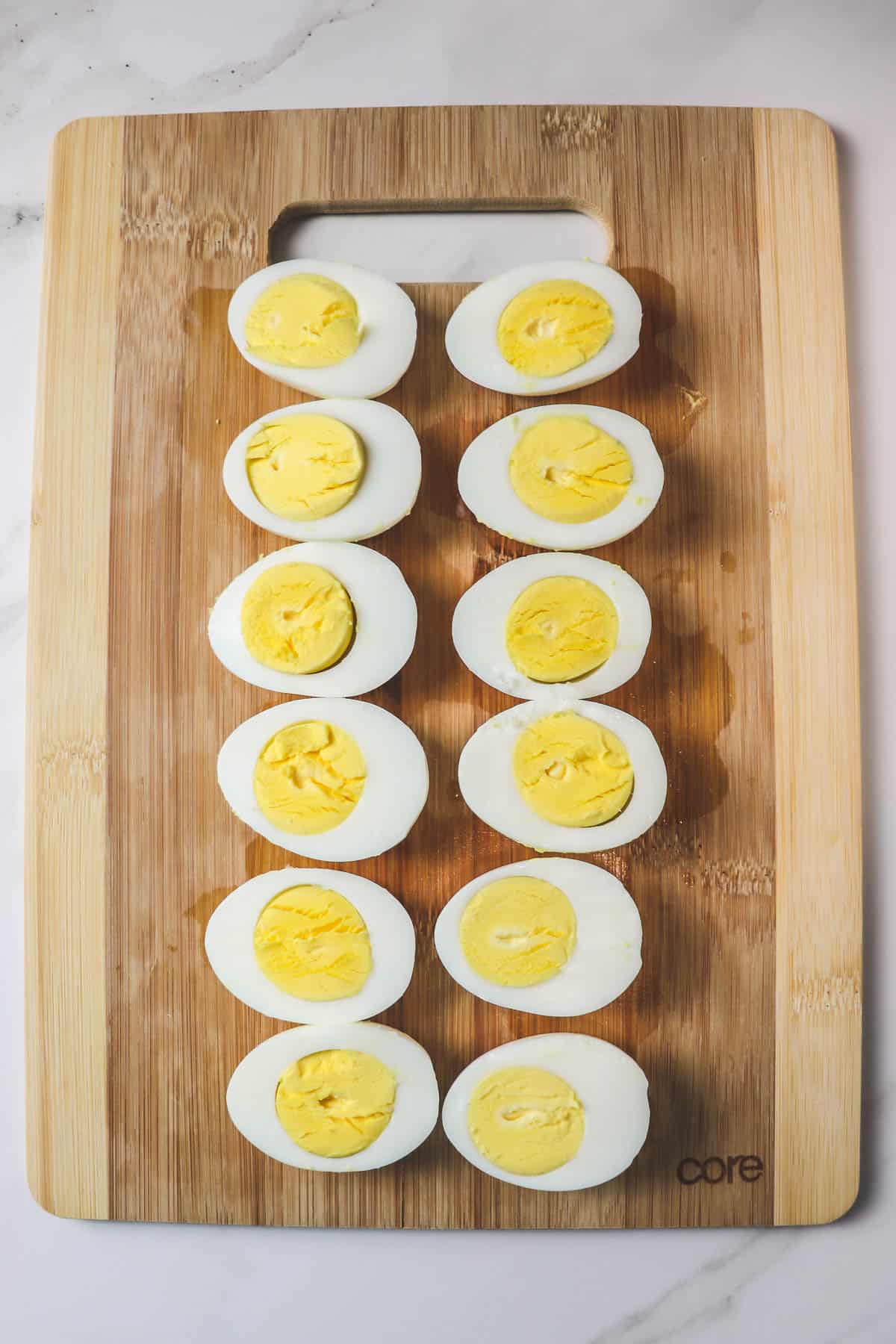 hard boiled eggs peeled and cut in half