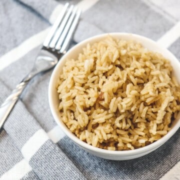 rice pilaf in bowl with fork
