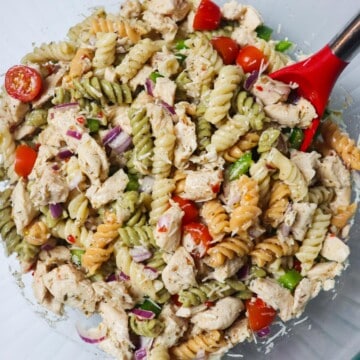 finished italian chicken pasta salad with spoon