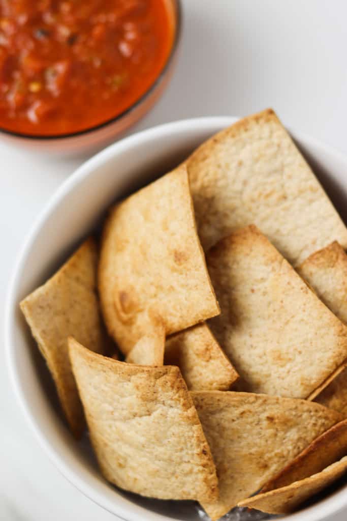 air fried low carb tortilla chips in a bowl with salsa