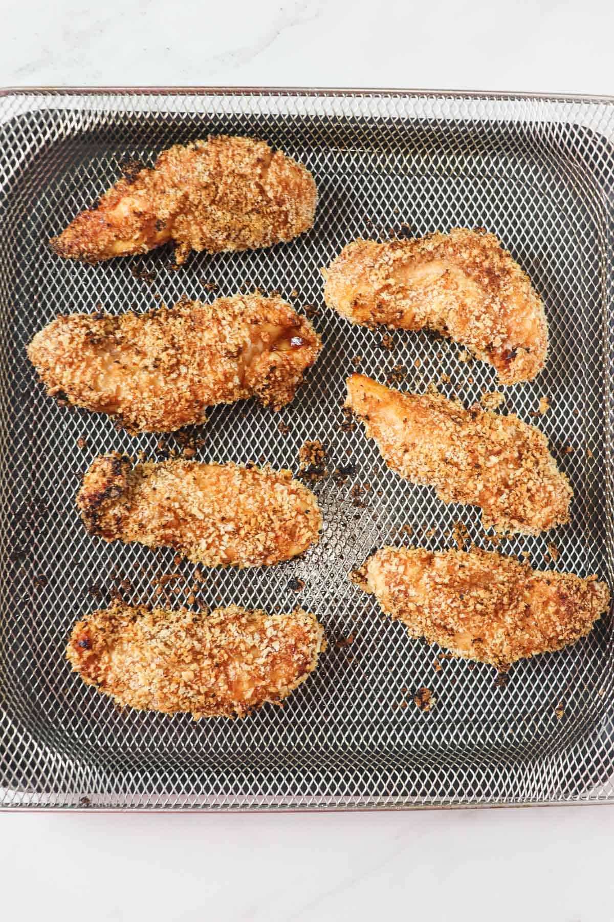 air fried crunchy bbq chicken tenders in air fryer basket