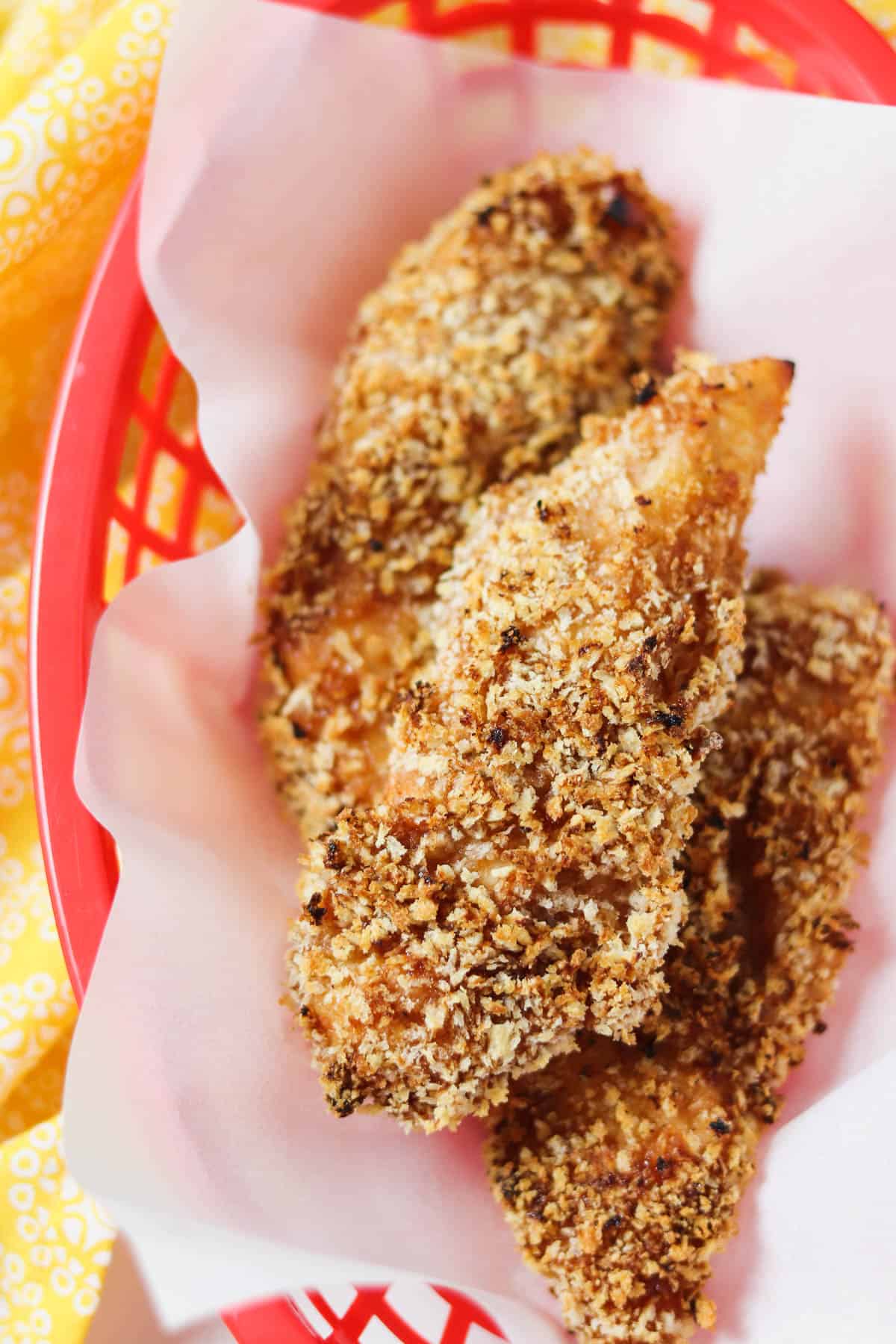 air fryer crunchy bbq chicken tenders in red basket