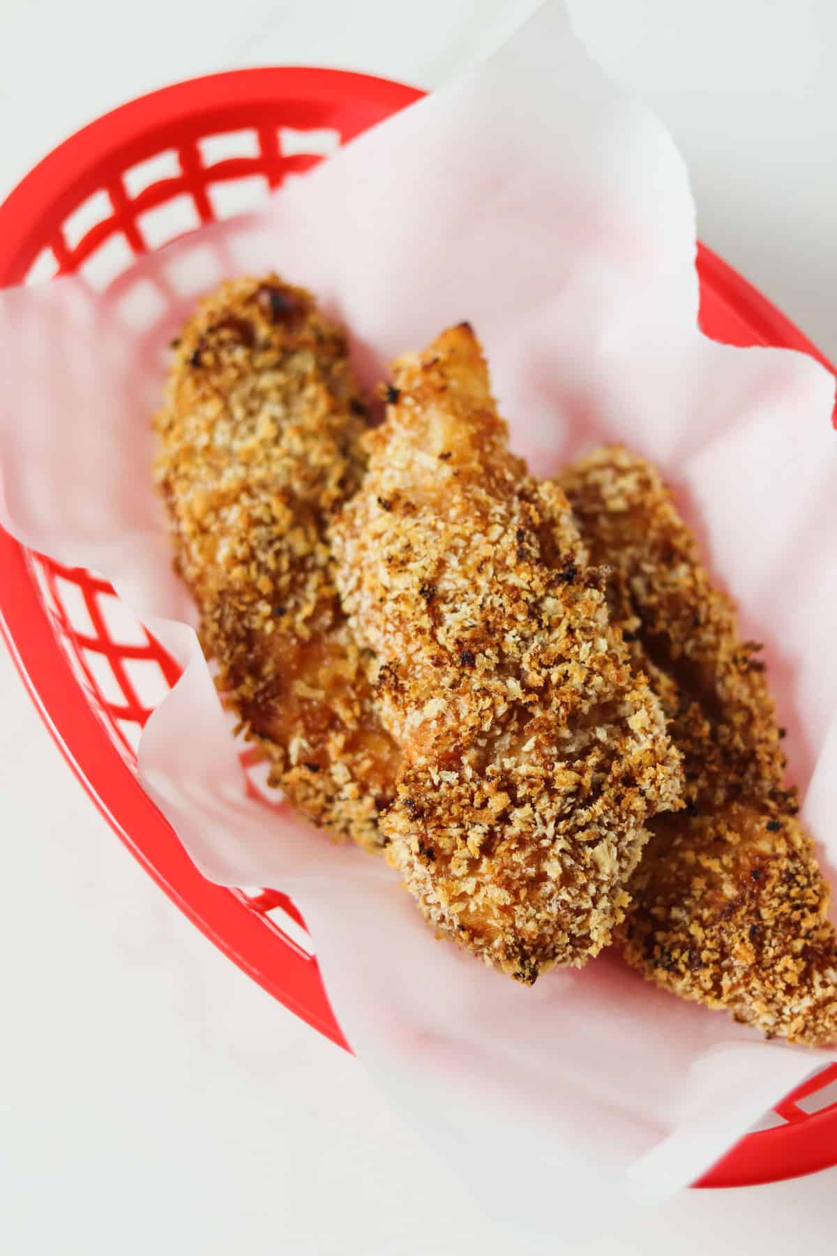 air fryer bbq chicken tenders in red basket