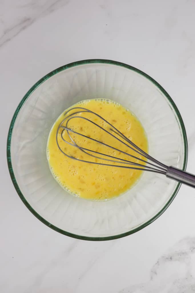 whisking together the milk and eggs