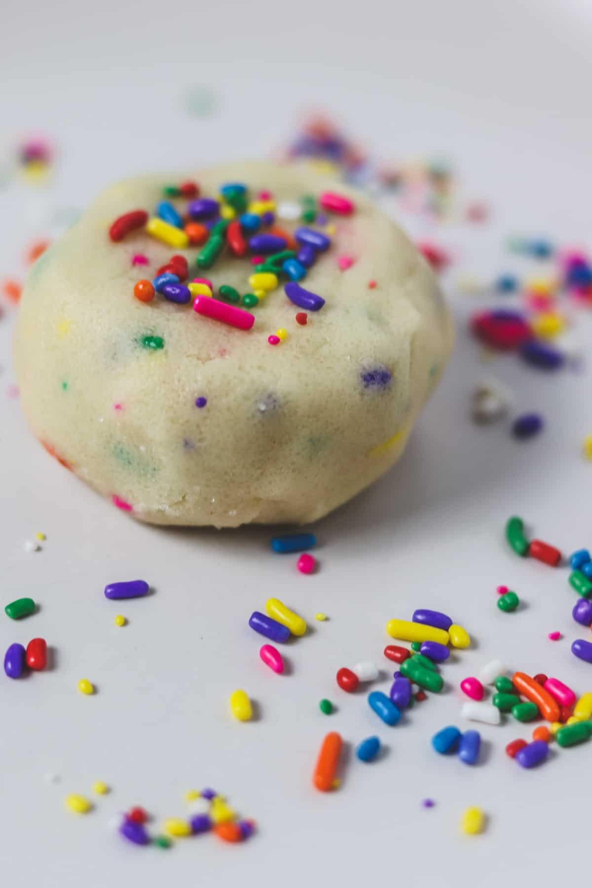 ball of edible sugar cookie dough with sprinkles