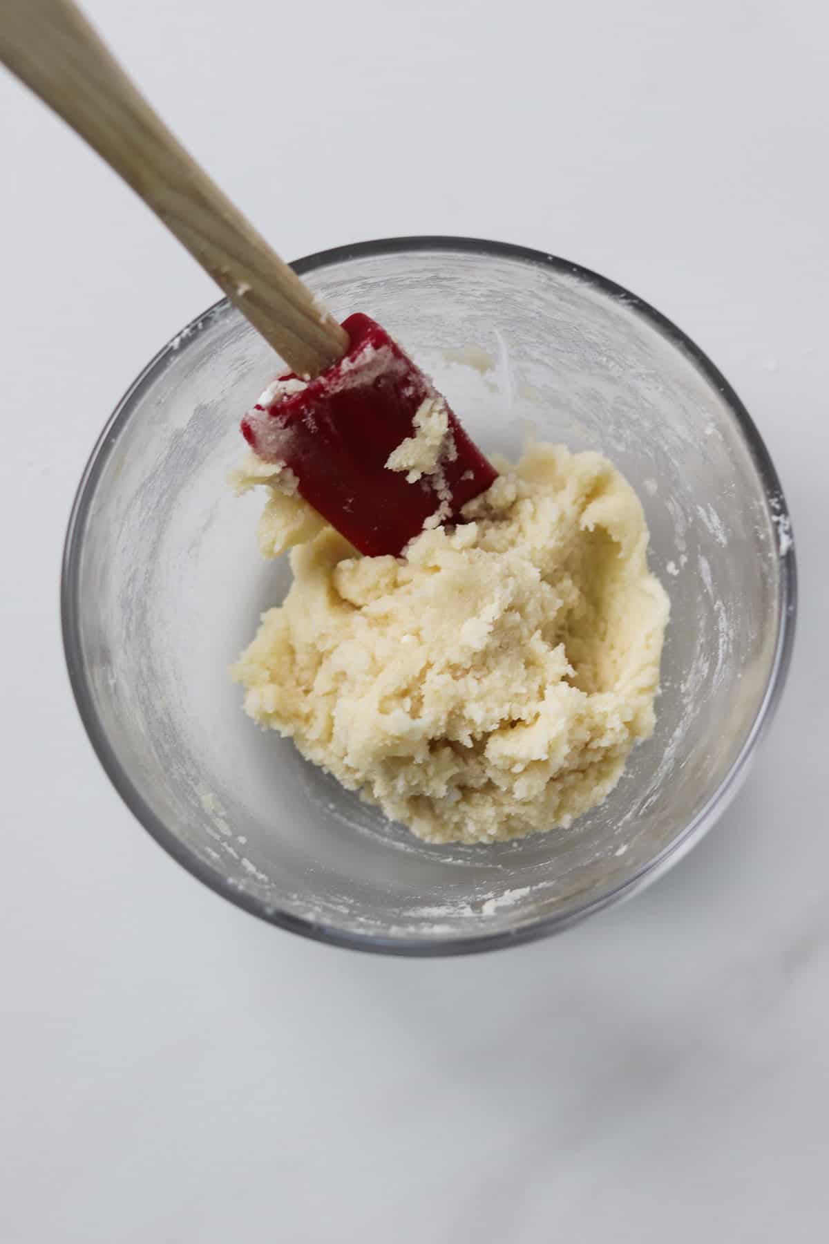 mixed cookie dough in small glass bowl