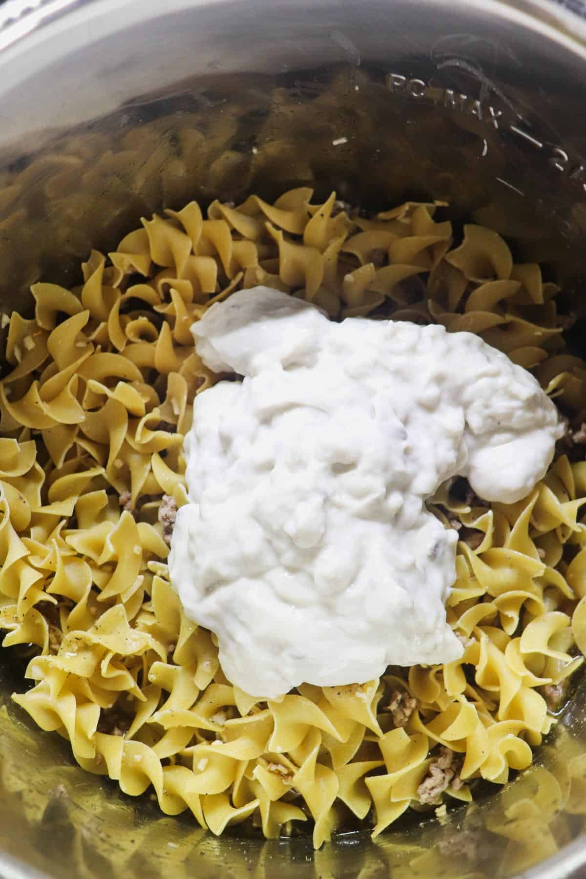 adding cream of mushroom soup on top of uncooked pasta