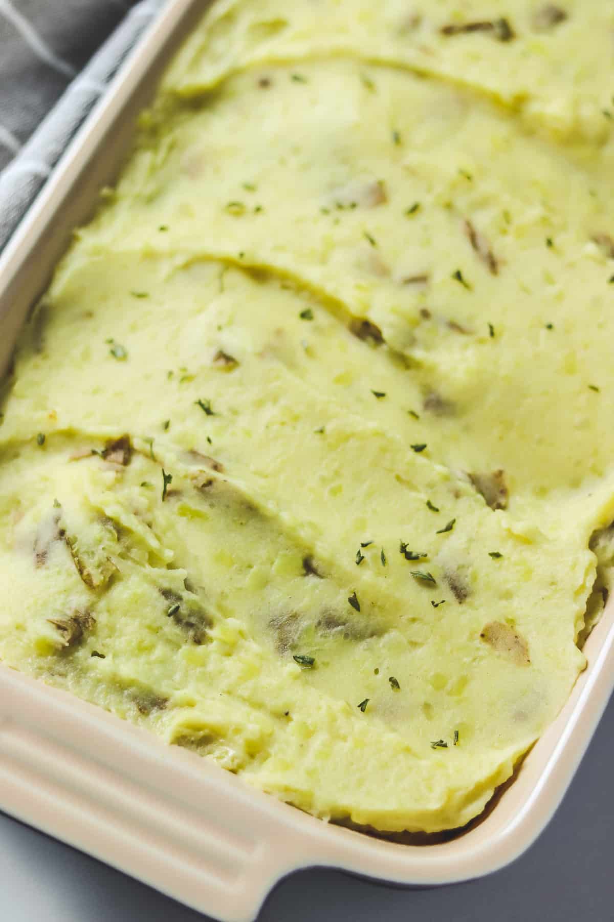casserole dish filled with instant pot mashed potatoes