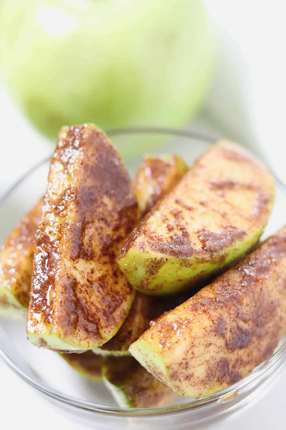 apple slices coated in cinnamon and sugar