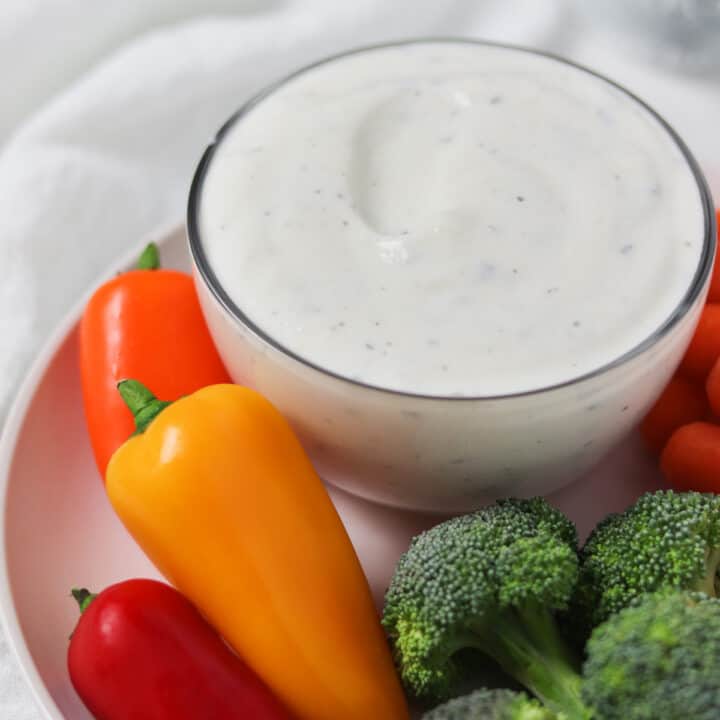 low calorie buttermilk ranch dip with vegetables on a white plate