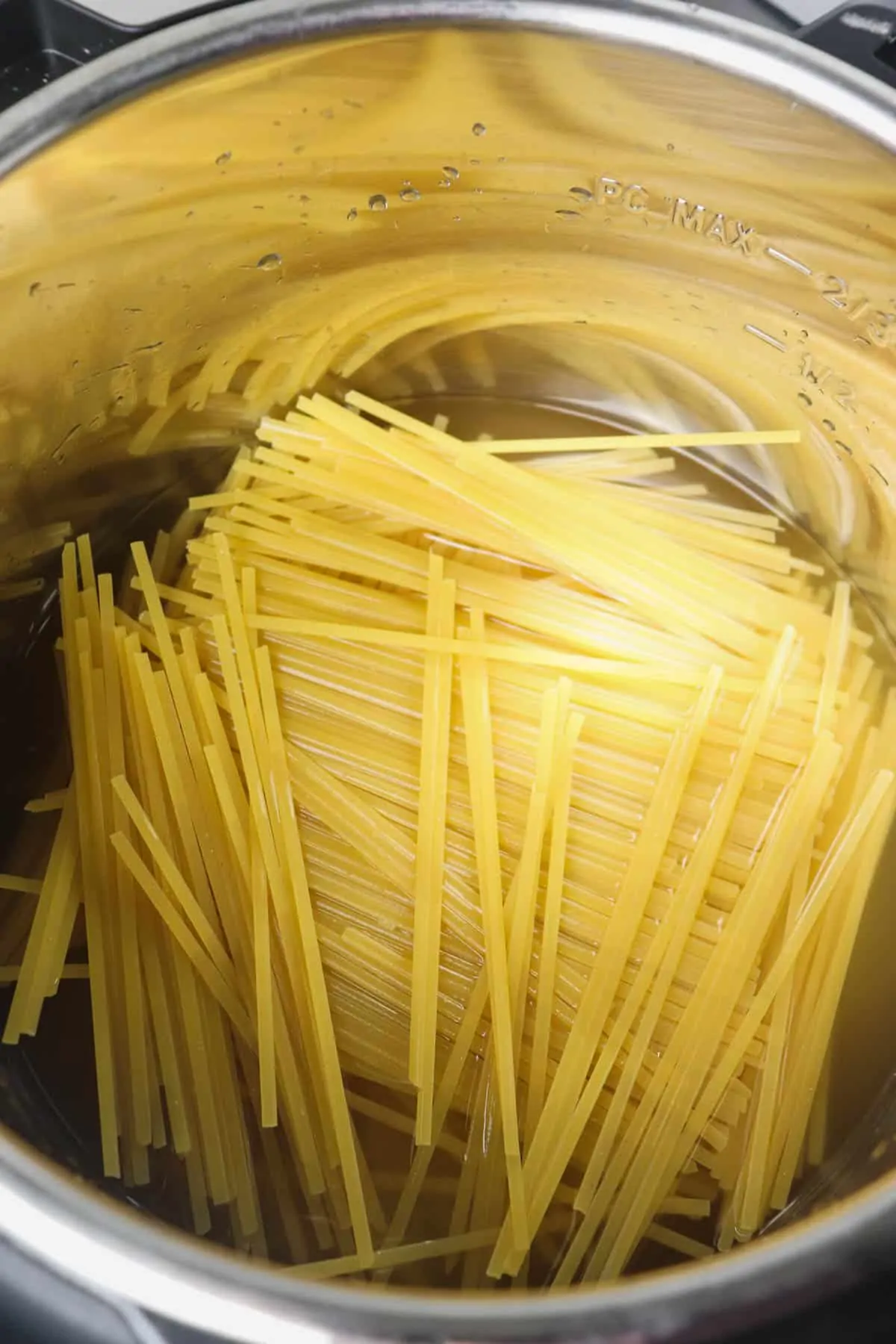 liquid and linguine noodles in the instant pot