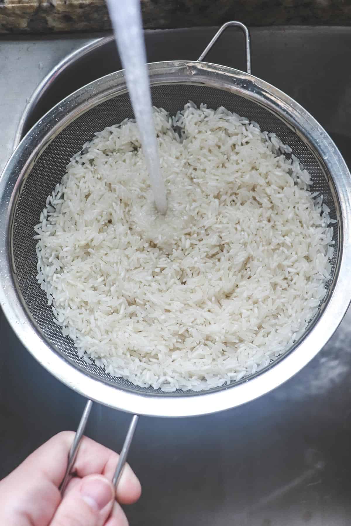 rinsing rice using a fine mesh strainer