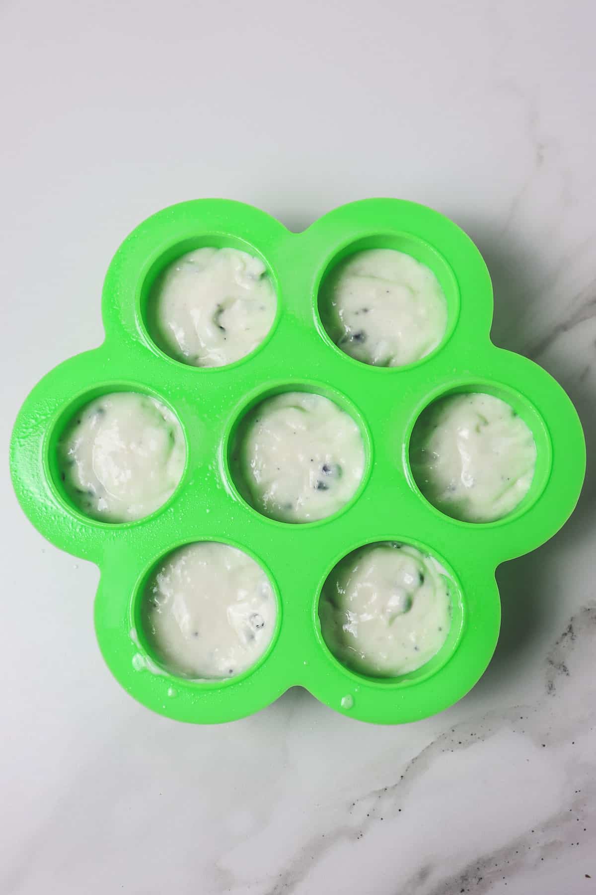 muffin batter in egg bite mold