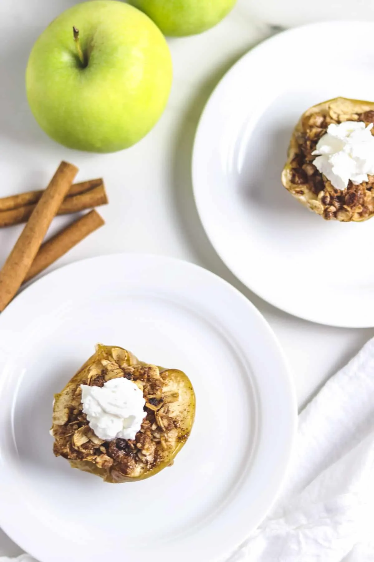 air fryer baked apples on white plates