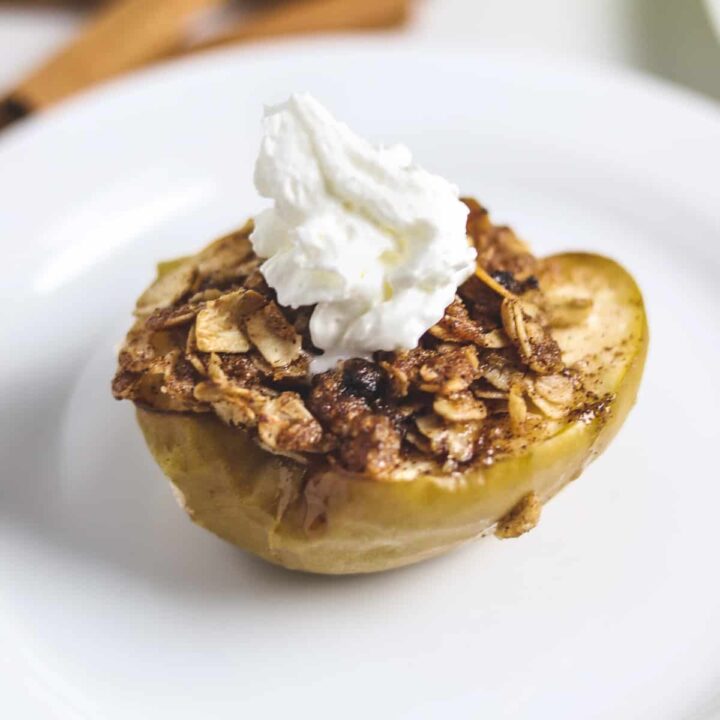 finished air fryer baked apple topped with whipped cream