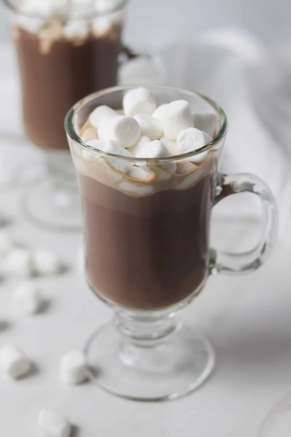 two cups of sugar-free hot chocolate topped with marshmallows