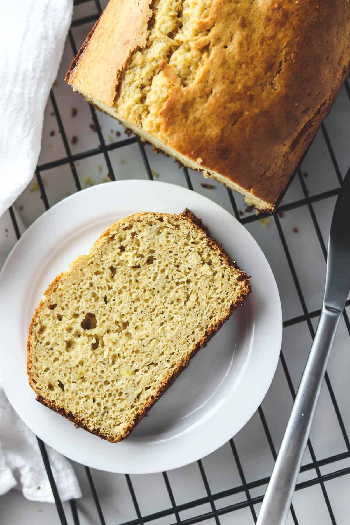 slice of healthy banana bread on a white plate