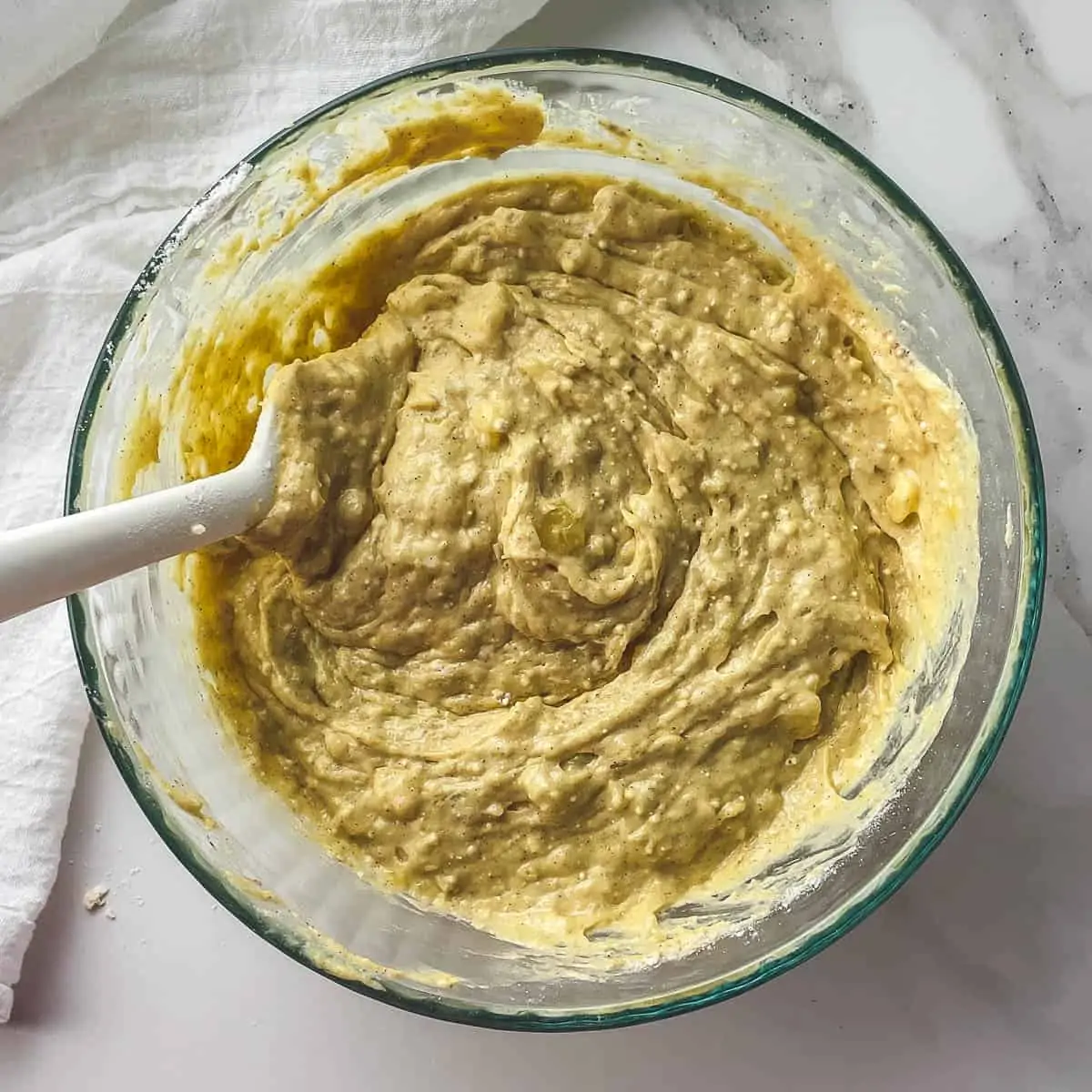 banana bread batter in a mixing bowl