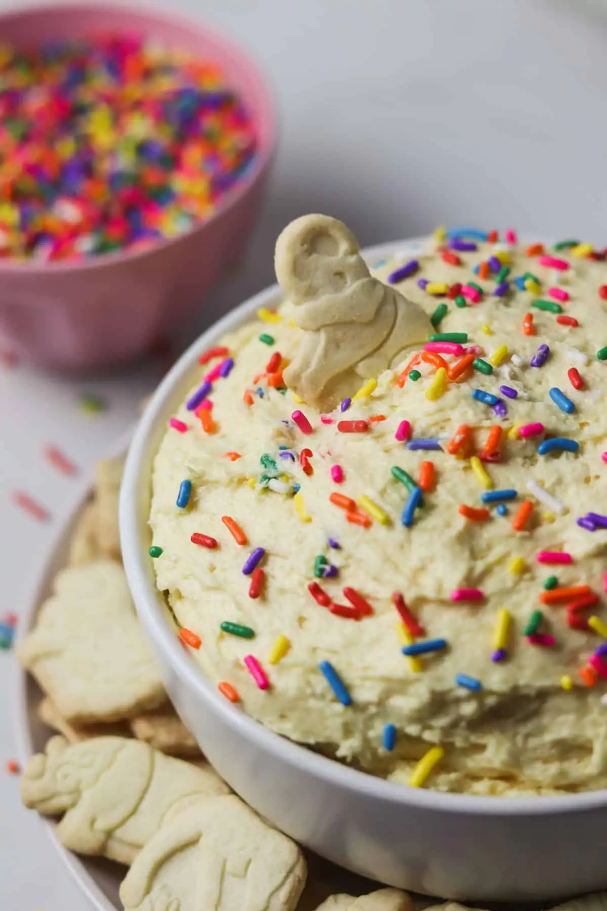 bowl of skinny dunkaroo dip with an animal cracker