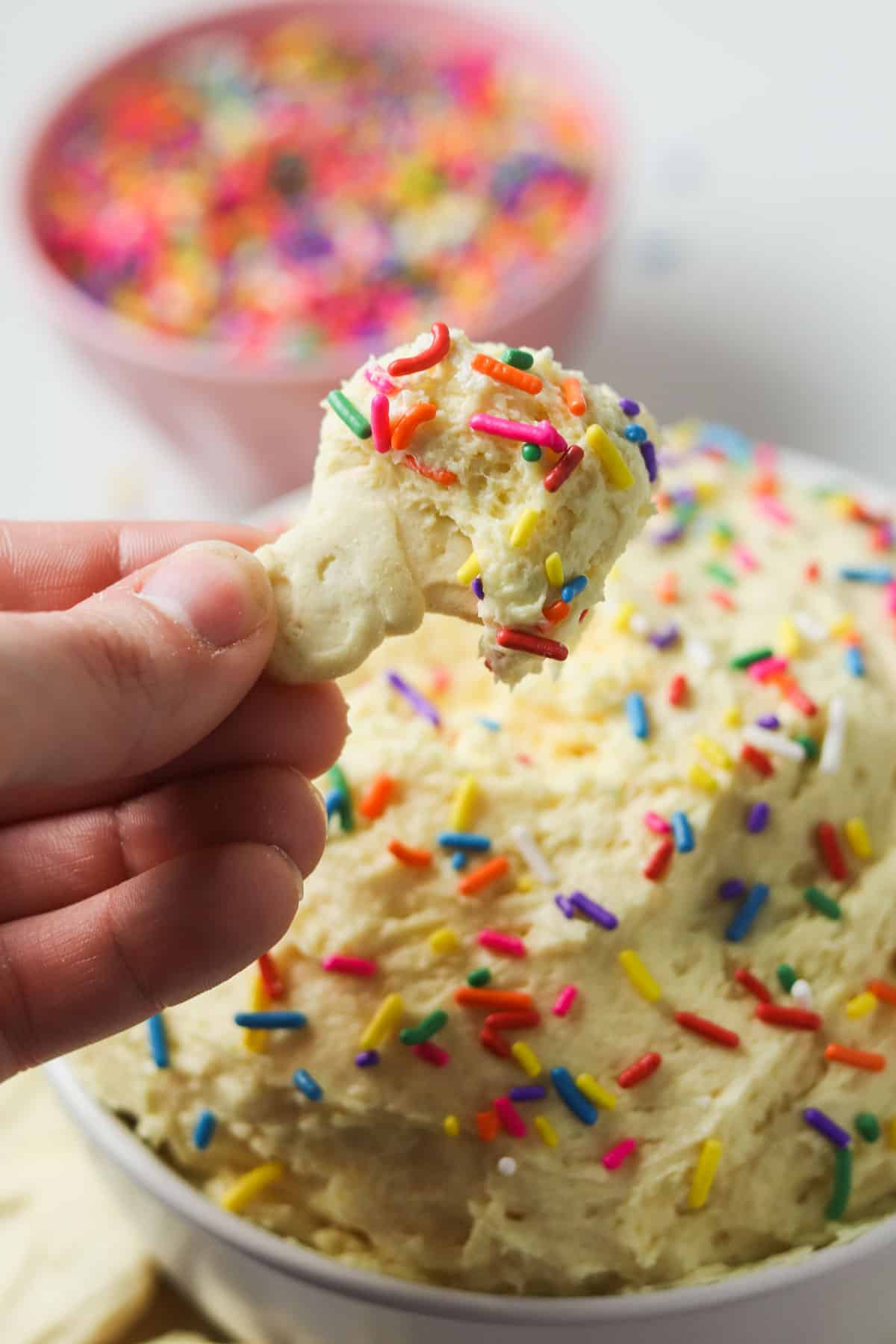 cake batter dip on an animal cookie