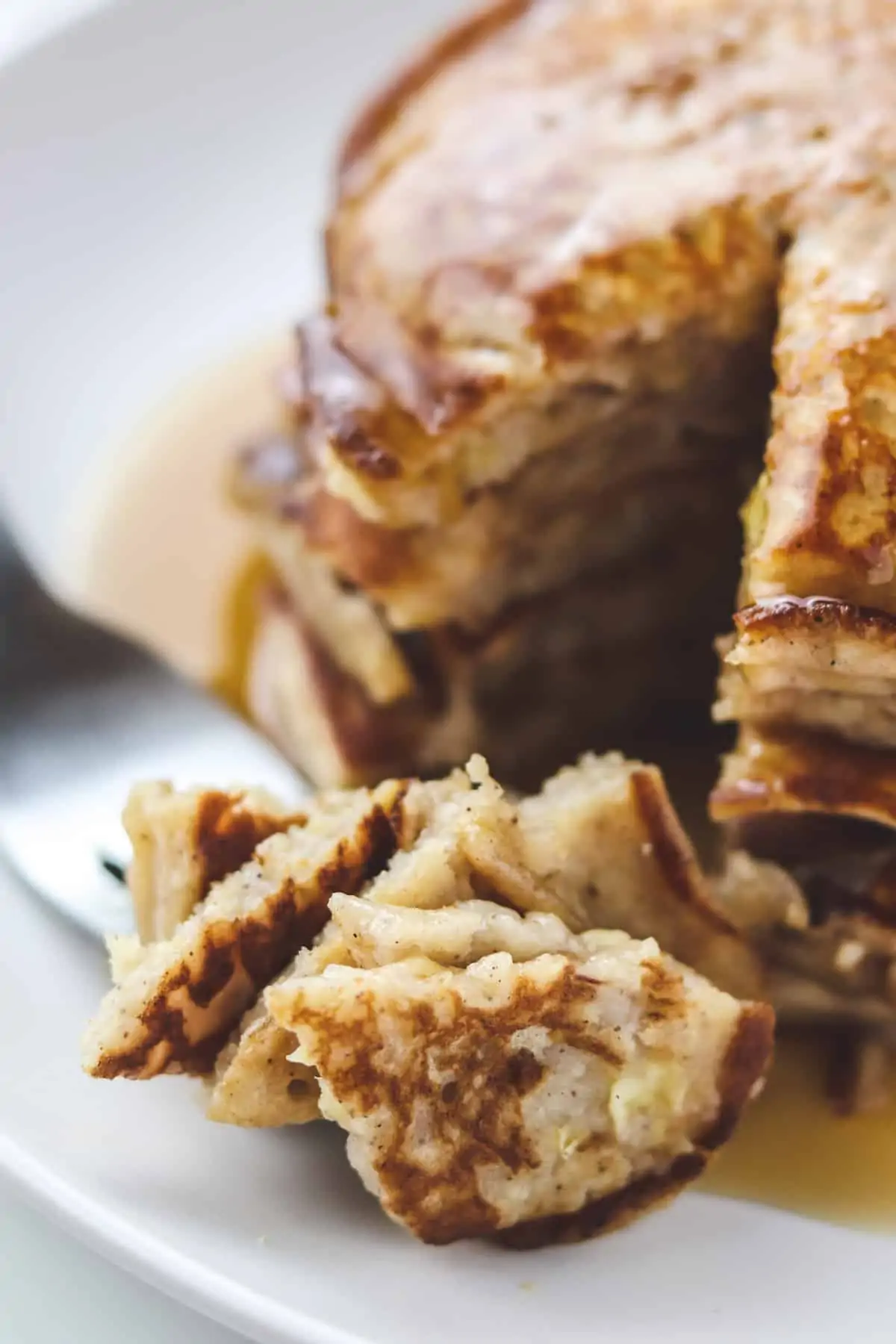 taking a bite of pancakes with a fork