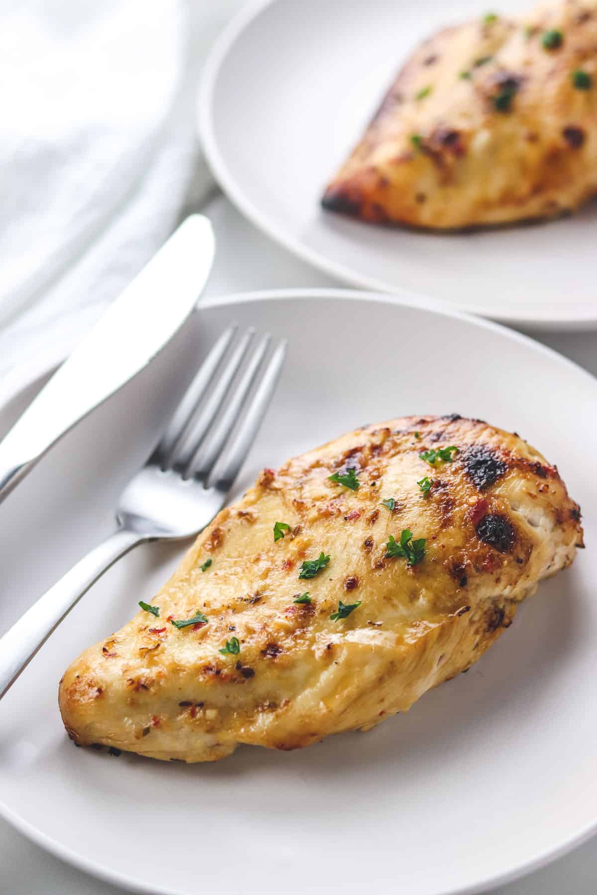 air fryer chicken breast on a white plate