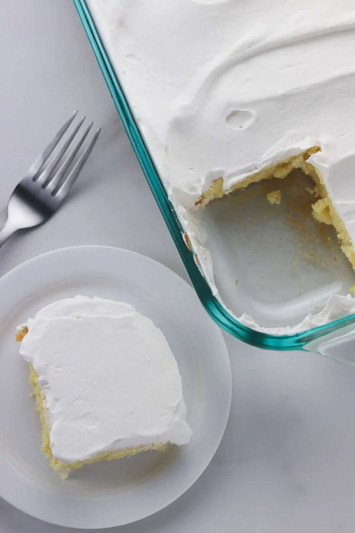 a piece of low-calorie yogurt cake on a white plate