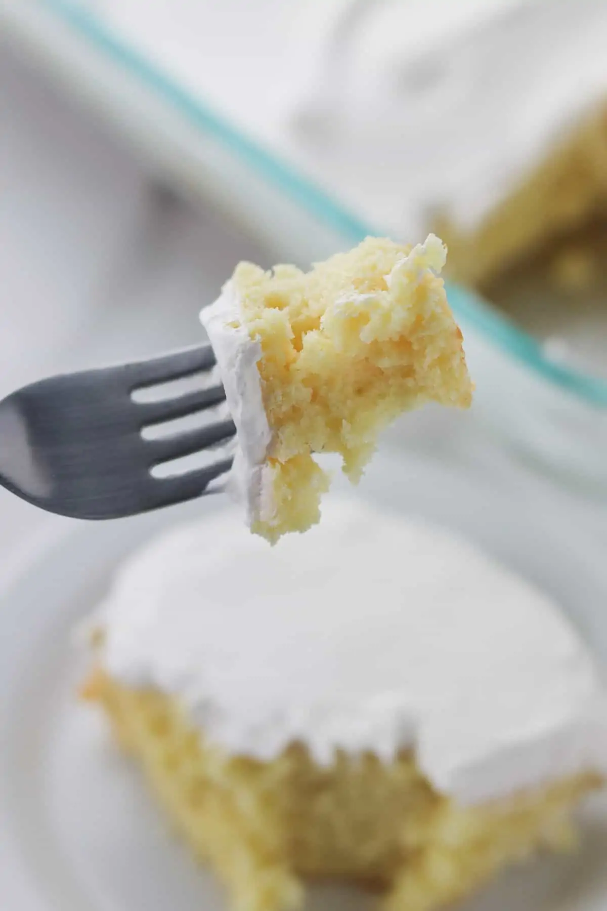 taking a bite of greek yogurt cake with a fork